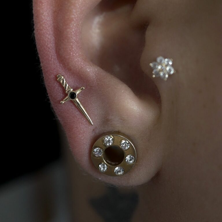 close up of ear piercings